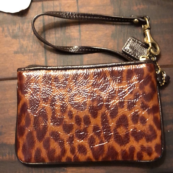 Coach leopard print wristlet. Like new condition. - Picture 3 of 6